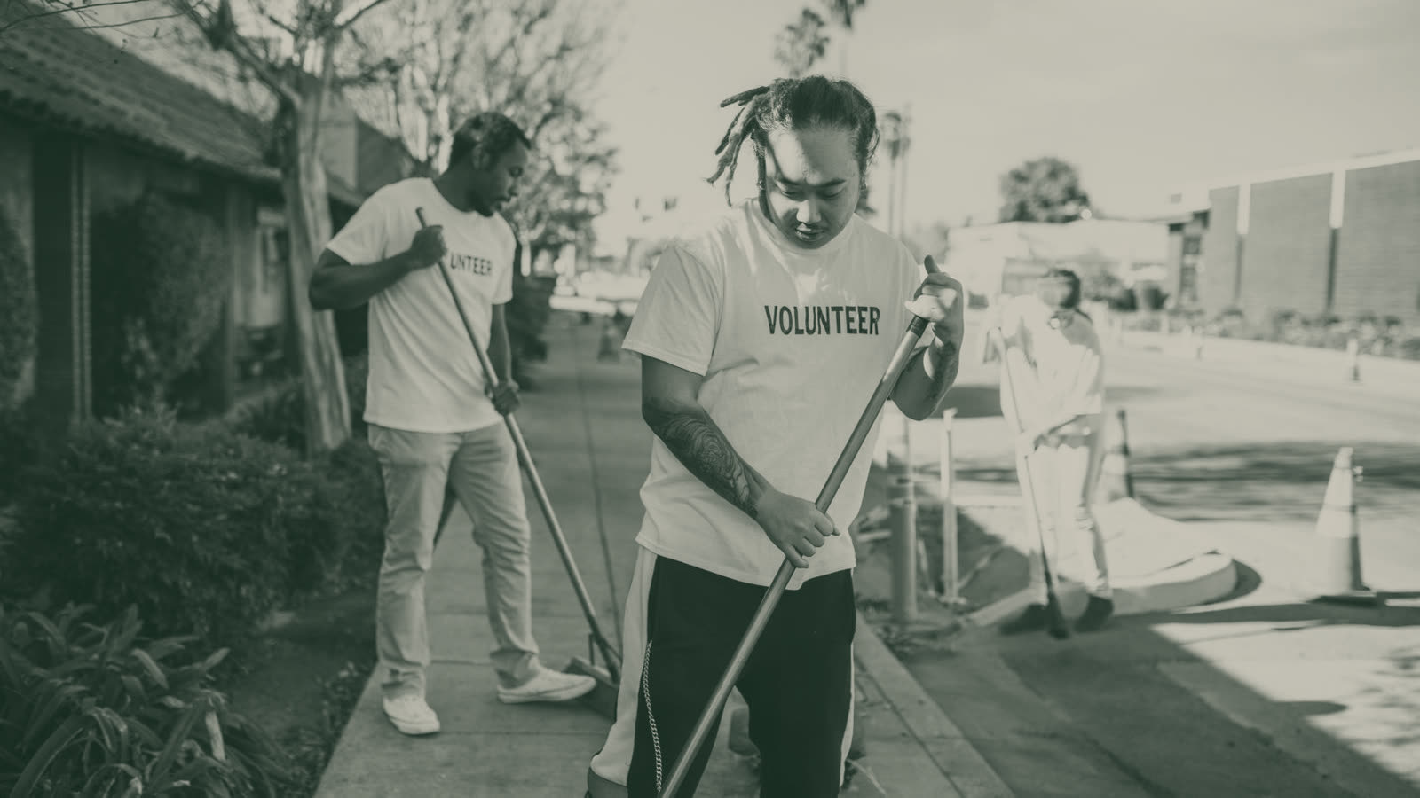 Volunteers cleaning up a Chattanooga street together